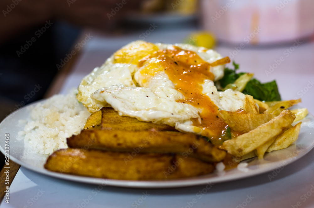 Cuban style rice with egg, french fries, plantain and rice Cuban style rice with egg, french fries, plantain and rice