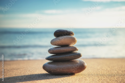Stones balance on the beach. Zen meditation. Yoga.