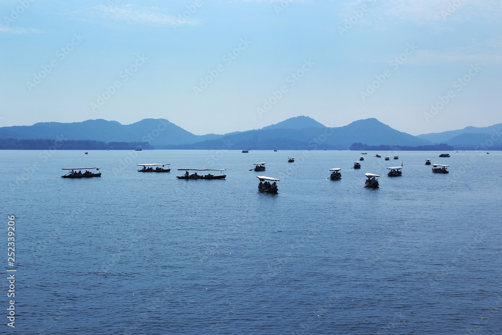 Asian boats on the West lake (Hangzhou, China)