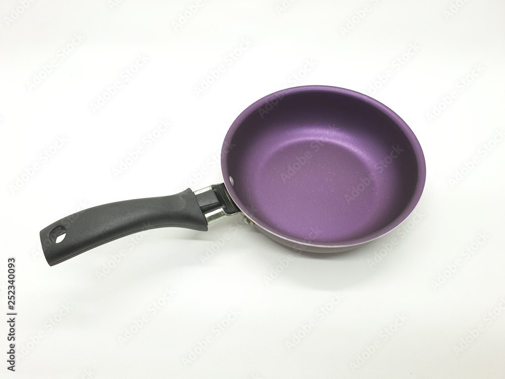 Frying pan or frypan or skillet a flat-bottomed pan used for frying, searing, and browning foods in white isolated background Frying pan or frypan or skillet a flat-bottomed pan used for frying, searing, and browning foods in white isolated background