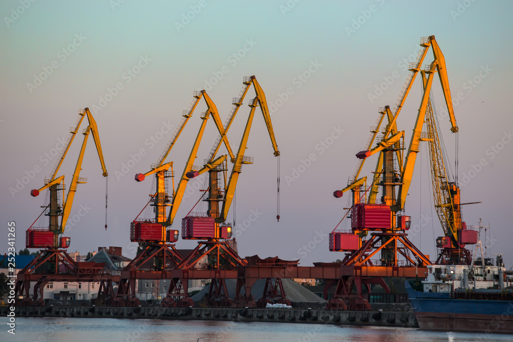 Jetty with port cranes