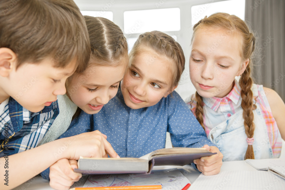 Group of kids studying in elementary school class Group of kids studying in elementary school class