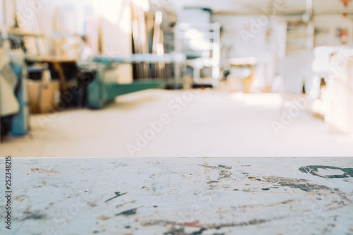 Blurred background of carpentry workshop. Copy space.