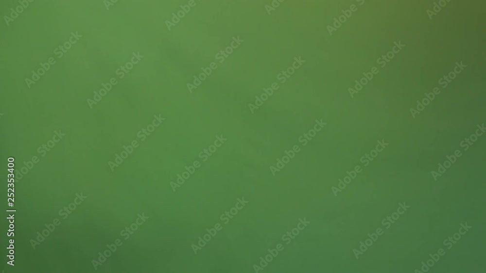 Medium side shot of a man using a knife to do single/multiple stabs on a green screen Medium side shot of a man using a knife to do single/multiple stabs on a green screen