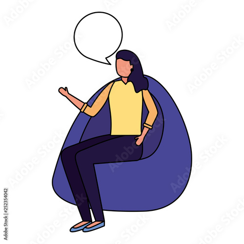 woman sitting on beanbag chair