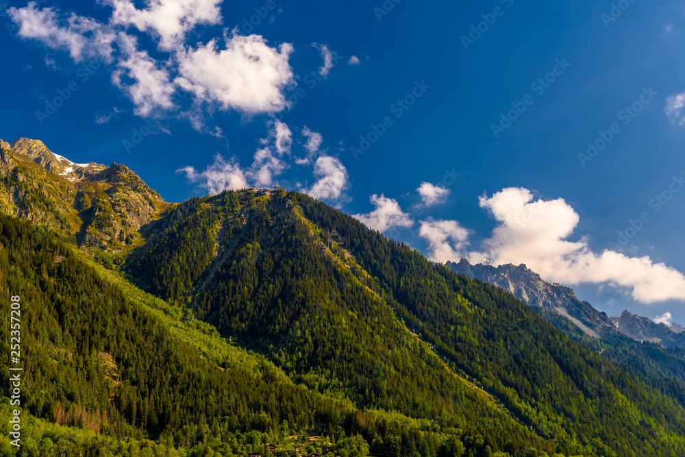 Green mountains covered with grass, Chamonix, Mont Blanc, Haute-Savoie, Alps, France Green mountains covered with grass, Chamonix, Mont Blanc, Haute-Savoie, Alps, France