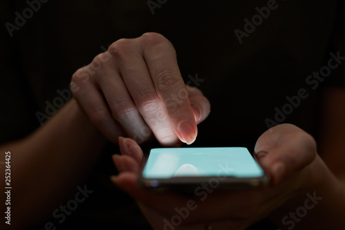 Holding hand on mobile phone