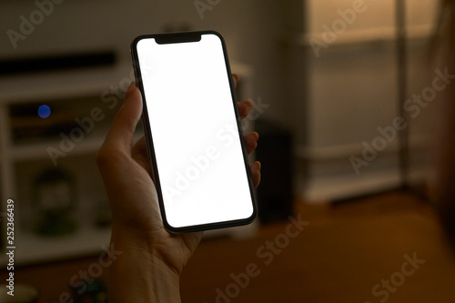 Holding hand on mobile phone