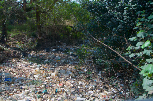 Open-air garbage landfill in a Riverbed of Cambodia