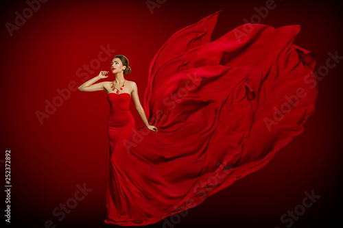 Fashion Model Red Flaming Dress, Woman in Long Fluttering Waving Gown Tail, Young Girl Beauty Portrait
