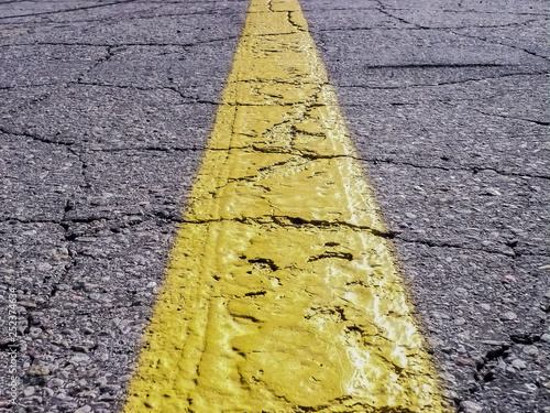 Asphalt texture with yellow line