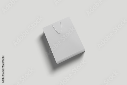 White paper bag mock-up for luxury store on soft gray background. 3D rendering.
