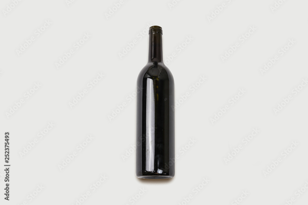 Wine bottle mock-up isolated on soft gray background.Can be used for your design and branding.