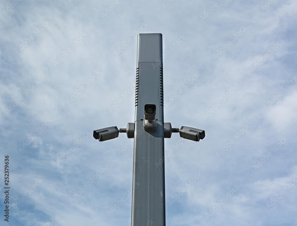 Security Camera in the sky above the city park Security Camera in the sky above the city park