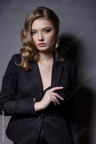 Portrait of a beautiful woman in a black jacket.