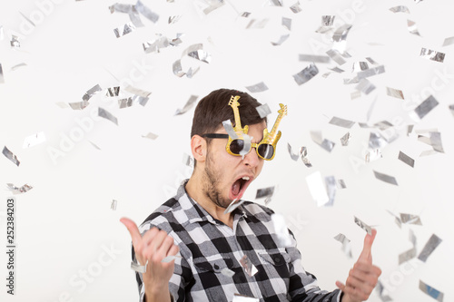 People, holidays and party concept - Funny man with crazy face over white background