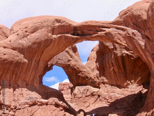 Double O Arch in Arches National Park in Utah, United States of America on a Sunny Day in the Desert.  © KingmaPhotos