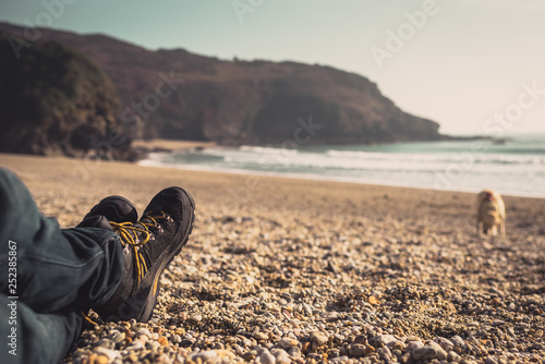 Sitting on pebble beach, hiking, walking