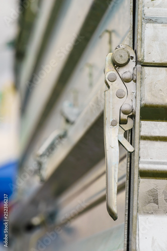 Metal handle lock from semi trailer photo