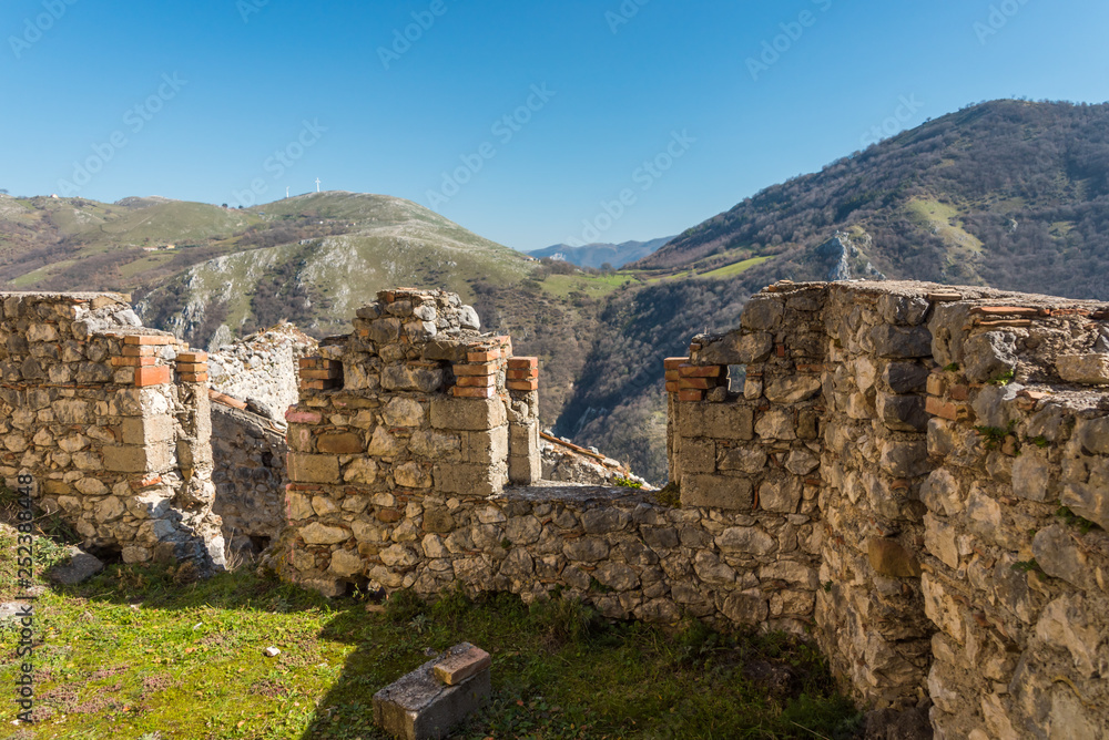 Fototapeta premium Abandoned Ruins of a Mountain Village Destroyed by an Earthquake in Italy