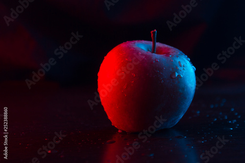 Wallpaper Mural One apple on the table. Neon light. Torontodigital.ca