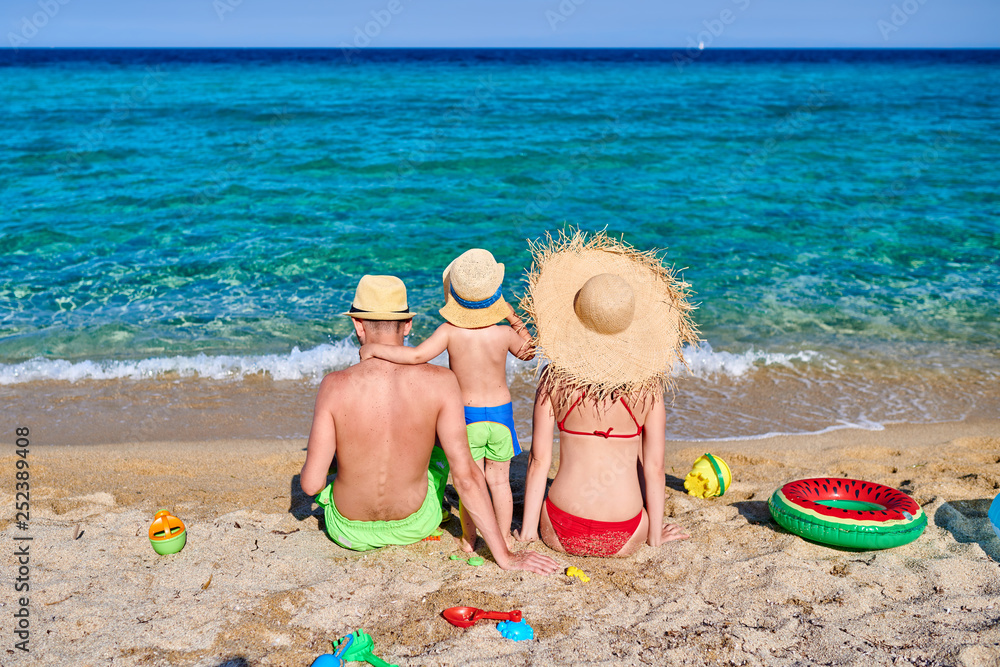 Family on beach in Greece