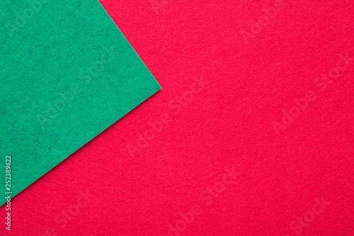 Two tone green red flannel fabric background with copy space