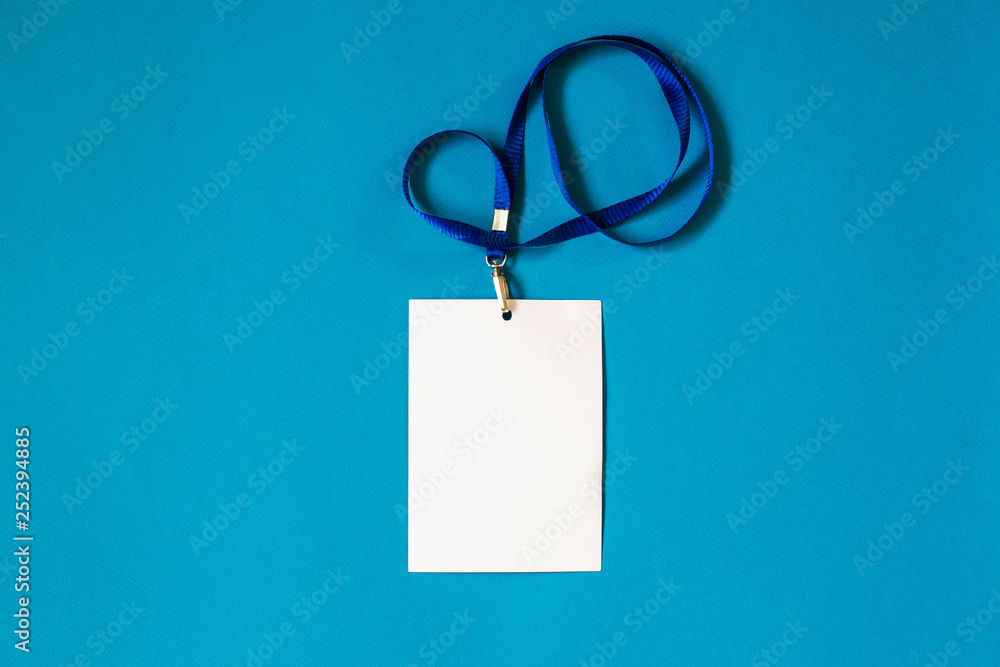 Empty ID card badge icon with blue belt, on blue background. Space for text, staff identity name tag template. Empty ID card badge icon with blue belt, on blue background. Space for text, staff identity name tag template.