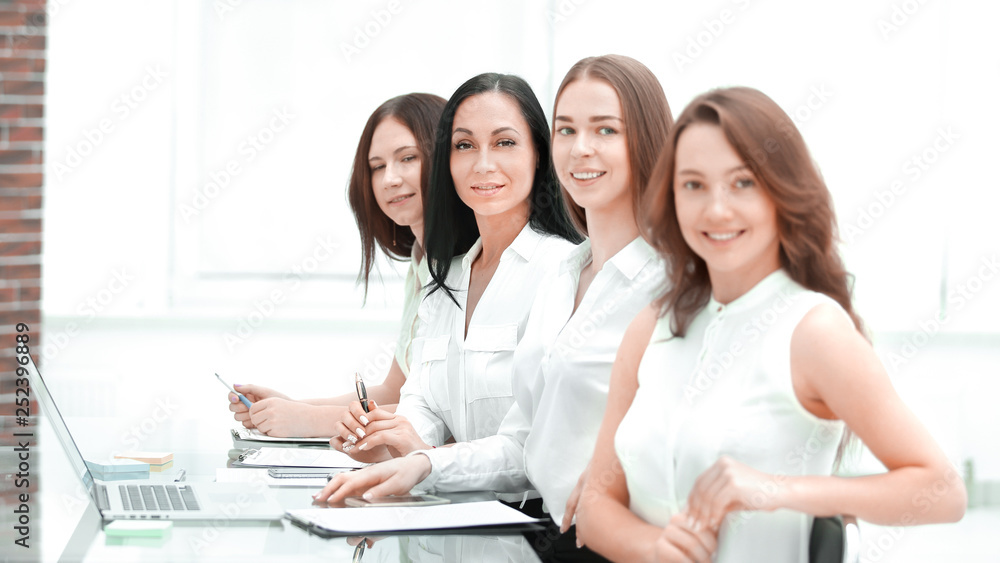 successful business team sitting at the Desk.photo with copy space successful business team sitting at the Desk.photo with copy space