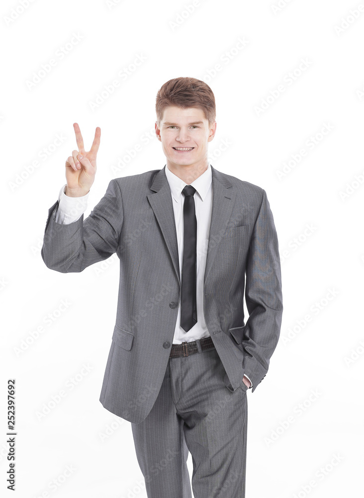 handsome businessman showing victory sign.isolated on a white background.