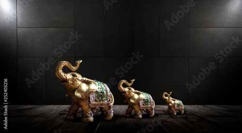 Golden elephant on a wooden...
