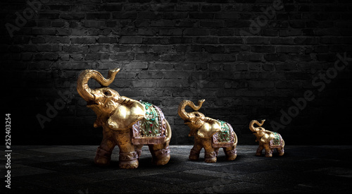 Golden elephant on a wooden...