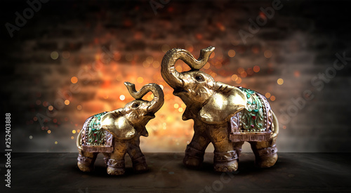 Golden elephant on a wooden...