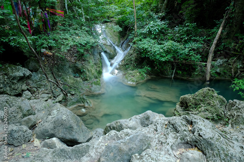 Fototapeta Naklejka Na Ścianę i Meble -  Erawan Waterfall in Kanchanaburi Province, Thailand Deep forest Waterfall