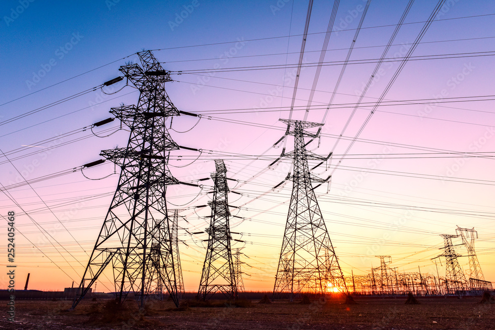 In the evening, the outline of the transmission tower