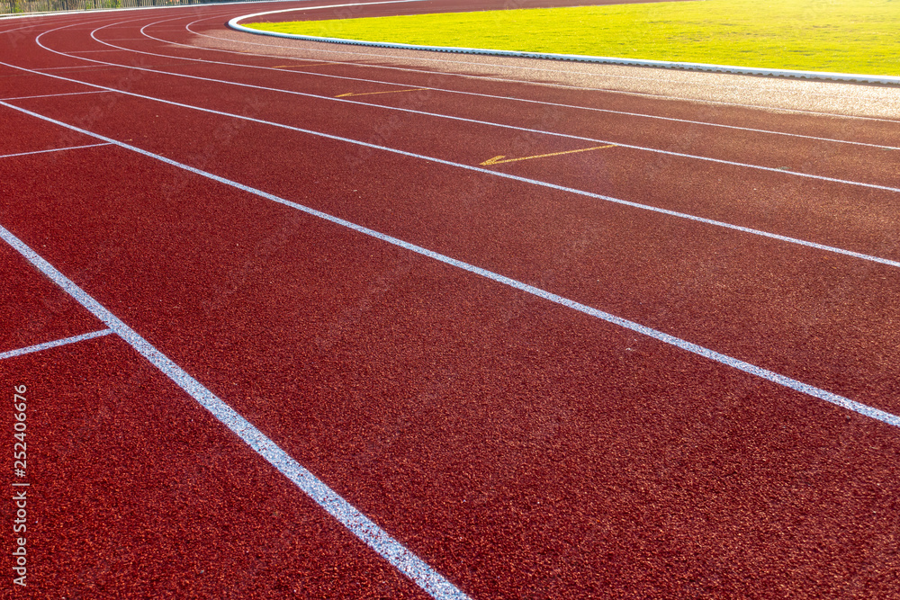 Fototapeta premium Red running track in stadium