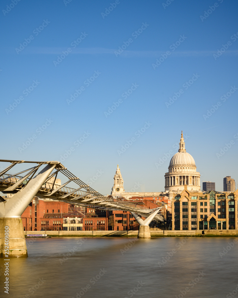 Fototapeta premium St Paul's Cathedral and Millennium Footbridge over the Thames