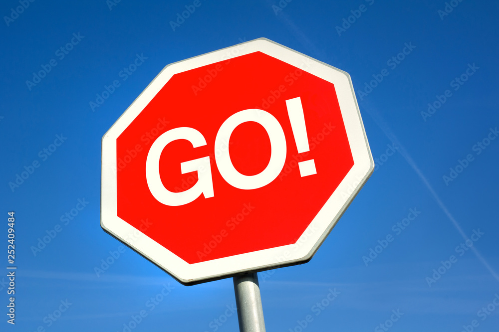 Motivational traffic sign - keep going, go ahead and start the ride. Motivational traffic sign - keep going, go ahead and start the ride.