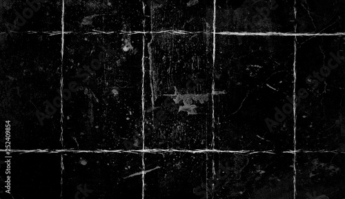 Vintage scratched grunge overlays on isolated black background space for text
