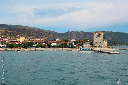 Fototapeta Naklejka Na Ścianę i Meble -  Old tower at the beach in Ouranoupoli, Athos peninsula, Chalkidiki, Greece