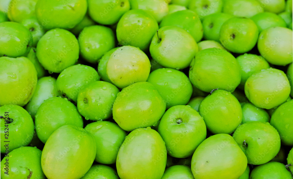 Fresh Thai milk jujube, Putsa Fruit (Ziziphus zizyphus) texture pattern background. Thai milk jujube is delicious tropical edible fruit has green smooth skin ,white pulp similar to apple Fresh Thai milk jujube, Putsa Fruit (Ziziphus zizyphus) texture pattern background. Thai milk jujube is delicious tropical edible fruit has green smooth skin ,white pulp similar to apple