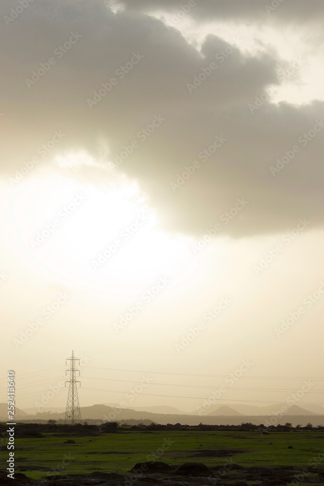 Obraz premium Power tower in cloudy weather, Maharashtra, India.