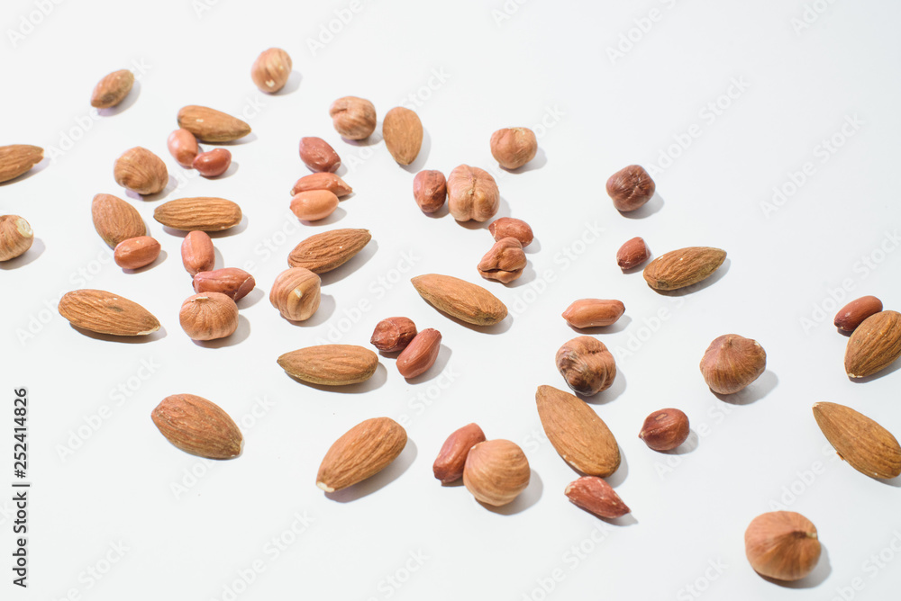 Pattern of nuts mix with copy space. Various nuts isolated on white. Pattern of nuts mix with copy space. Various nuts isolated on white.