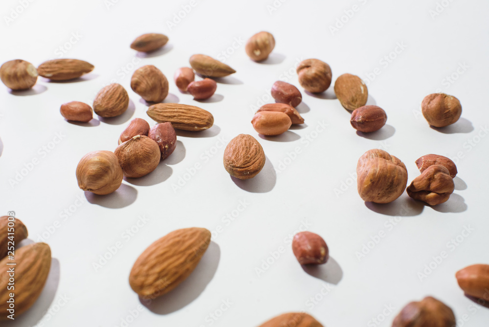 Pattern of nuts mix with copy space. Various nuts isolated on white. Pattern of nuts mix with copy space. Various nuts isolated on white.