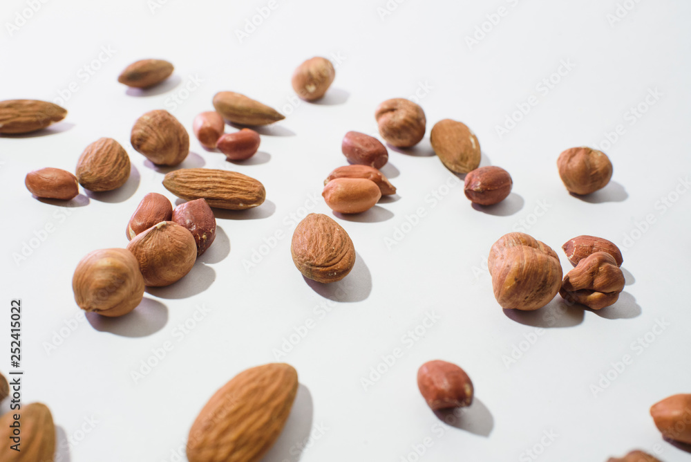 Pattern of nuts mix with copy space. Various nuts isolated on white. Pattern of nuts mix with copy space. Various nuts isolated on white.