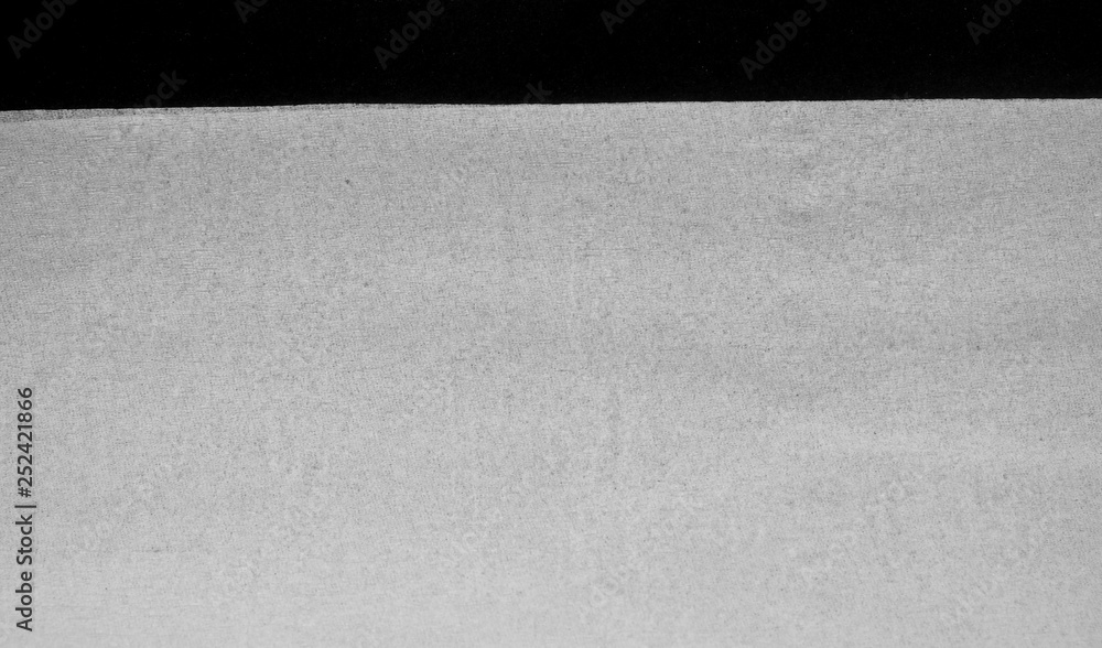 Fototapeta premium Texture of white tissue paper on black background