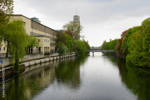 isar river mirroring constructions and trees
