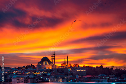 A beautiful sunset in Istanbul with long lights and a mosque in the sou...