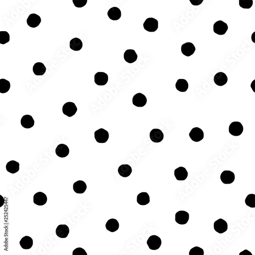 Polka dot seamless pattern in hand draw style. Vector spot texture with black point isolated on white background. Grunge effect