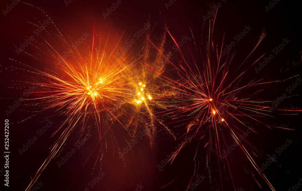 Fireworks in the sky at night as a background Fireworks in the sky at night as a background